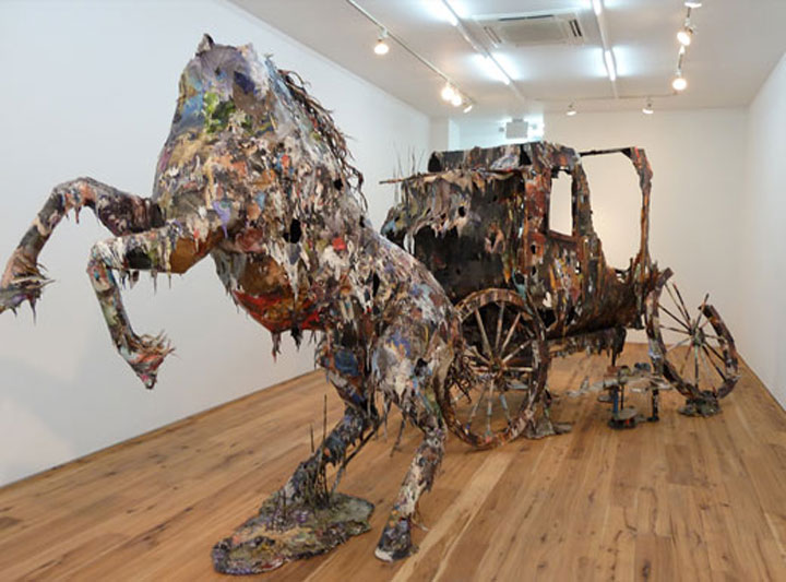 Creepy Sculptures Made out of Used Books Chris_Jones_01 