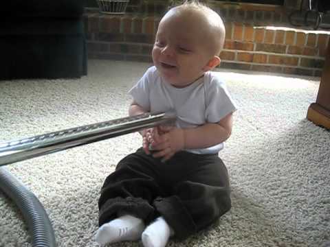 Baby thinks the vacuum is so funny!