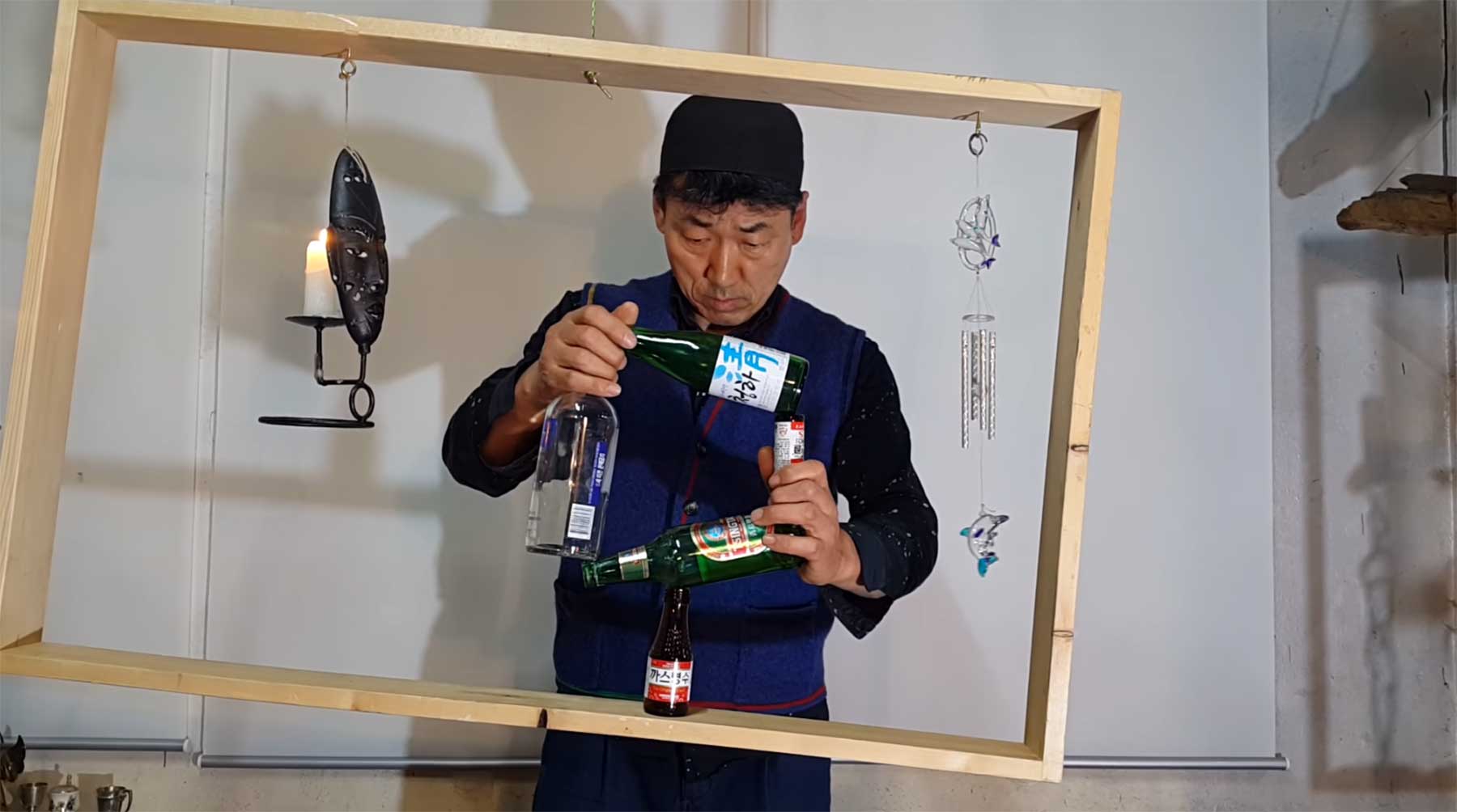 Flaschenviereck im drehängenden Rahmen ausbalancieren