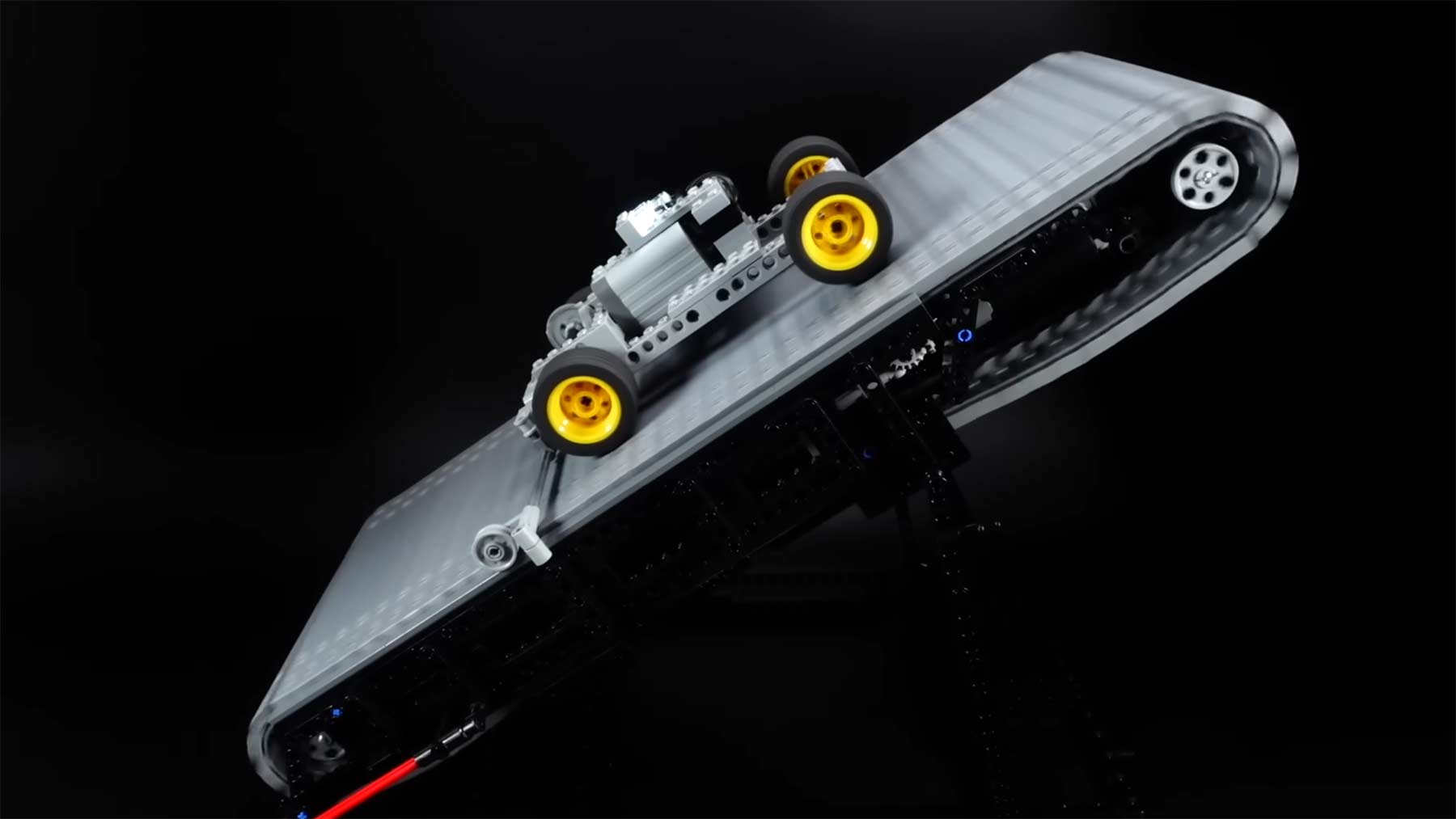 LEGO-Auto endlos auf einem Laufband fahren lassen LEGO-technik-auto-laufband-endlos-herunterfahren 